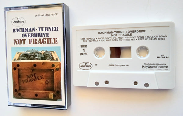 BACHMAN-TURNER OVERDRIVE (Randy Bachman, Fred Turner) - "Not Fragile" (w/"You Ain't Seen Nothing Yet") - Cassette Tape  (1974/1990) [Digitally Remastered] - Mint